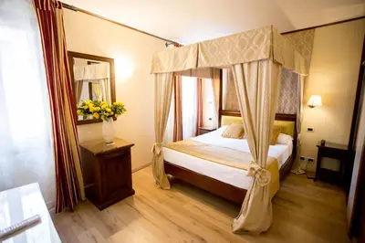 Letto o letti in una camera di Residenza Rivo Alto