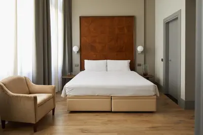 Letto o letti in una camera di Hotel Dei Dragomanni