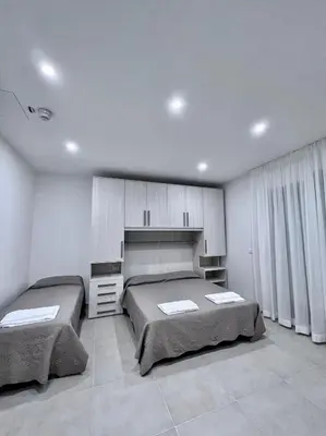 Letto o letti in una camera di Residence TERRAMARE