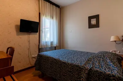 Letto o letti in una camera di Locanda Da Renzo