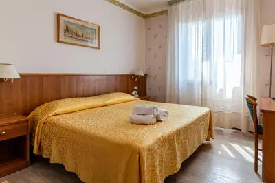 Letto o letti in una camera di Locanda Da Renzo