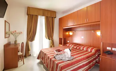 Letto o letti in una camera di Hotel Storione
