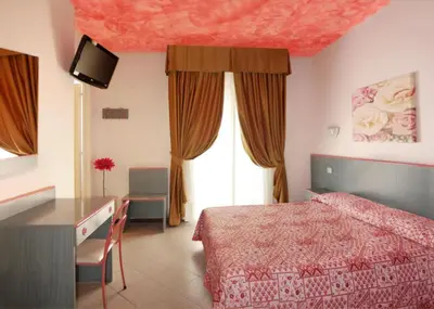 Letto o letti in una camera di Hotel Storione