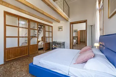 Letto o letti in una camera di Ca' Magia - Rialto Exclusive Residence by Wonderful Italy