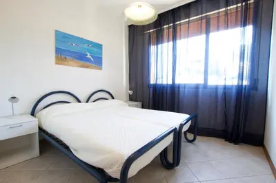 Letto o letti in una camera di Park Residence 1 - Home Immobiliare