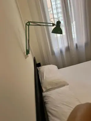 Letto o letti in una camera di Venezia, 100 mt to Station,FREE parking, Shuttle Airport, Train Station Gorizia