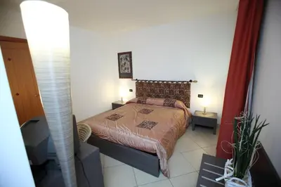 Letto o letti in una camera di B&B Ca' Loi