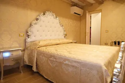 Letto o letti in una camera di Ca' Fabrizio close to San Marco