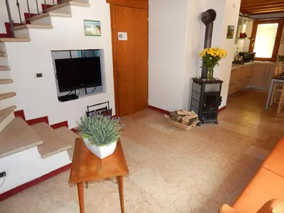 TV o dispositivi per l'intrattenimento presso Corte Santa Felicita Guest House