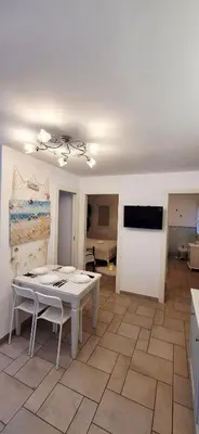 TV o dispositivi per l'intrattenimento presso Appartamento Perla Marina