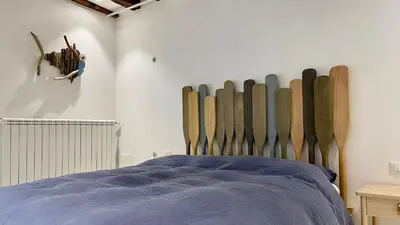 Letto o letti in una camera di Ca' dell'Ombra Felice - canal view