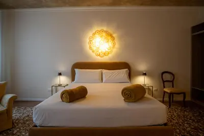 Letto o letti in una camera di Ca' Turelli Dimora Storica