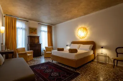 Letto o letti in una camera di Ca' Turelli Dimora Storica