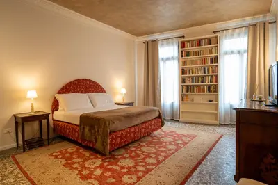 Letto o letti in una camera di Ca' Turelli Dimora Storica
