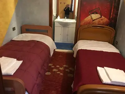 Letto o letti in una camera di CA ' SAN SAMUELE