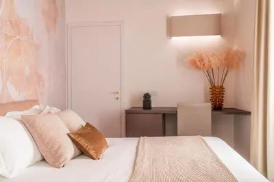 Letto o letti in una camera di Ninfea Luxury Suites