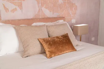 Letto o letti in una camera di Ninfea Luxury Suites
