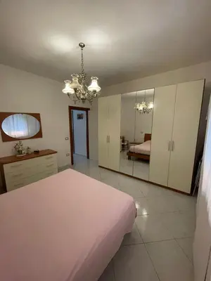 Letto o letti in una camera di Casa Milano - Sottomarina