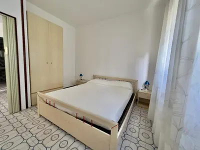 Letto o letti in una camera di Residence 5 Pini - Home Immobiliare