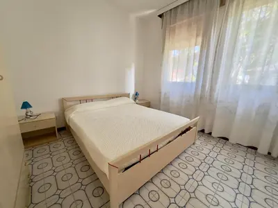 Letto o letti in una camera di Residence 5 Pini - Home Immobiliare