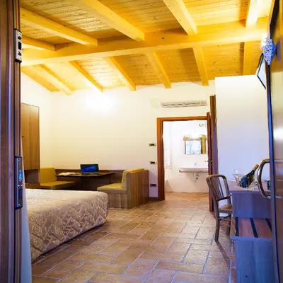 Letto o letti in una camera di Agriturismo Da Merlo