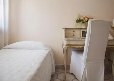 Letto o letti in una camera di Hotel Villa Serena