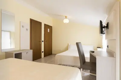 Letto o letti in una camera di Park Hotel Ristorante Ca' Bianca