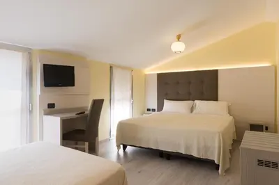 Letto o letti in una camera di Park Hotel Ristorante Ca' Bianca