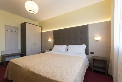 Letto o letti in una camera di Park Hotel Ristorante Ca' Bianca