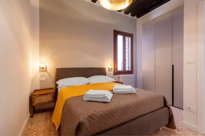 Letto o letti in una camera di Querini Suite-Balcony on canal, close to San Marco