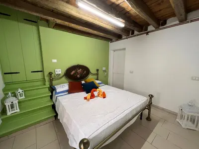 Letto o letti in una camera di Casetta Vigo