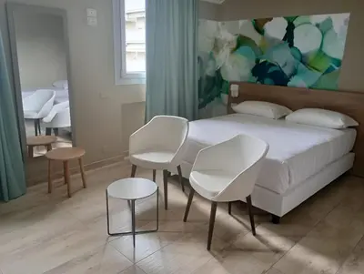 Letto o letti in una camera di Wyndham Garden Conegliano