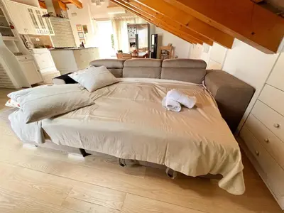 Letto o letti in una camera di ERMAN HOUSE Mansarda sulla Riviera del Brenta Venezia