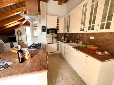 Cucina o angolo cottura di ERMAN HOUSE Mansarda sulla Riviera del Brenta Venezia