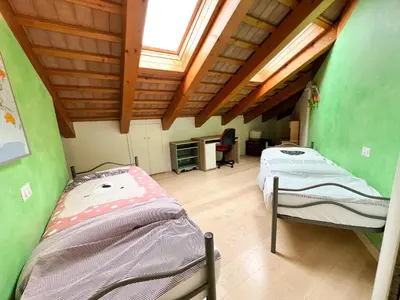 Letto o letti in una camera di ERMAN HOUSE Mansarda sulla Riviera del Brenta Venezia