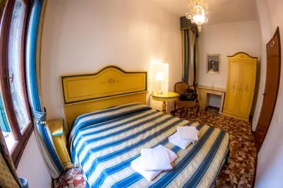 Letto o letti in una camera di Zaffiro Apartment VENICE