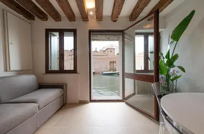 Area soggiorno di Ca' Leoncino - Venice canal front apartment