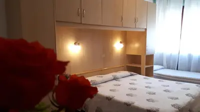 Letto o letti in una camera di Hotel Villa Dina