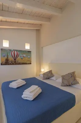 Letto o letti in una camera di CorteLuna incantevole a 500 metri da p.zza S.Marco