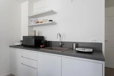 Cucina o angolo cottura di Residenza SubitoSanto - Appartamento 4B 