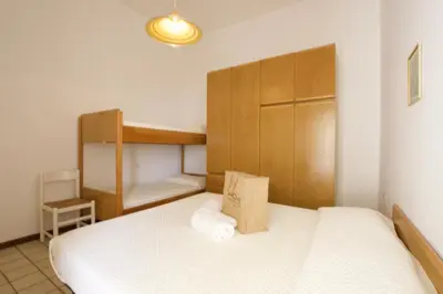 Letto o letti in una camera di Bagni Miramare - Home Immobiliare Jesolo