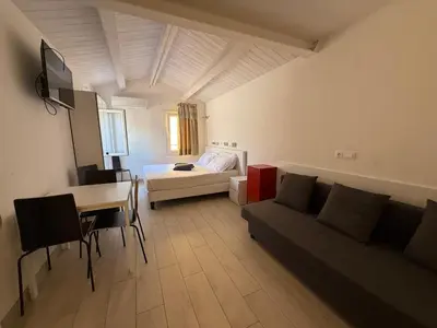 Letto o letti in una camera di Mare & Laguna