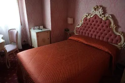 Letto o letti in una camera di Hotel Rialto