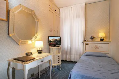 Letto o letti in una camera di Hotel Rialto