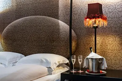 Letto o letti in una camera di Hotel Palazzo Barbarigo Sul Canal Grande