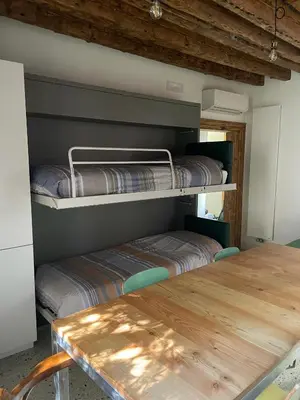 Letto o letti in una camera di Remer Suites
