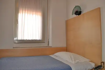 Letto o letti in una camera di Hotel Igea