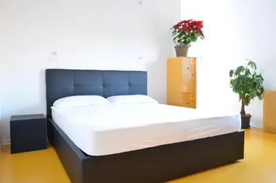 Letto o letti in una camera di Nomad Hostel