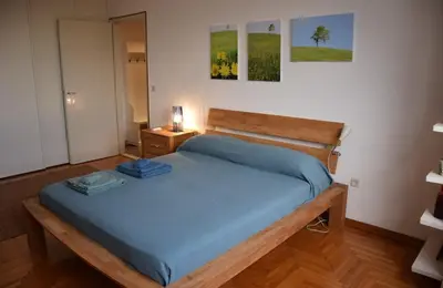 Letto o letti in una camera di DARIO.HOME Amabile dimora in centro a Treviso