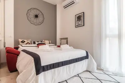 Letto o letti in una camera di Grey House in the heart of @Treviso